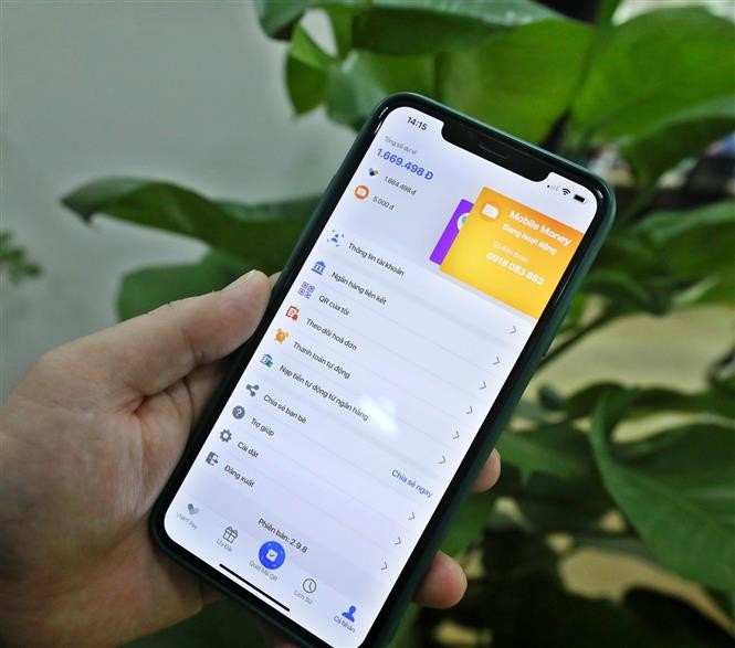 Mobile Money - Giải pháp quan trọng đối với Chiến lược tài chính toàn diện quốc gia của Việt Nam. (Nguồn: TTXVN)
