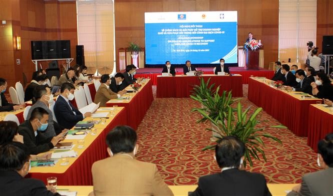 Toàn cảnh Hội thảo “Giải pháp và đề xuất chính sách hỗ trợ doanh nghiệp nhỏ và vừa phục hồi sau đại dịch Covid-19, ngày 24/12 tại Thái Bình. (Nguồn: TTXVN)