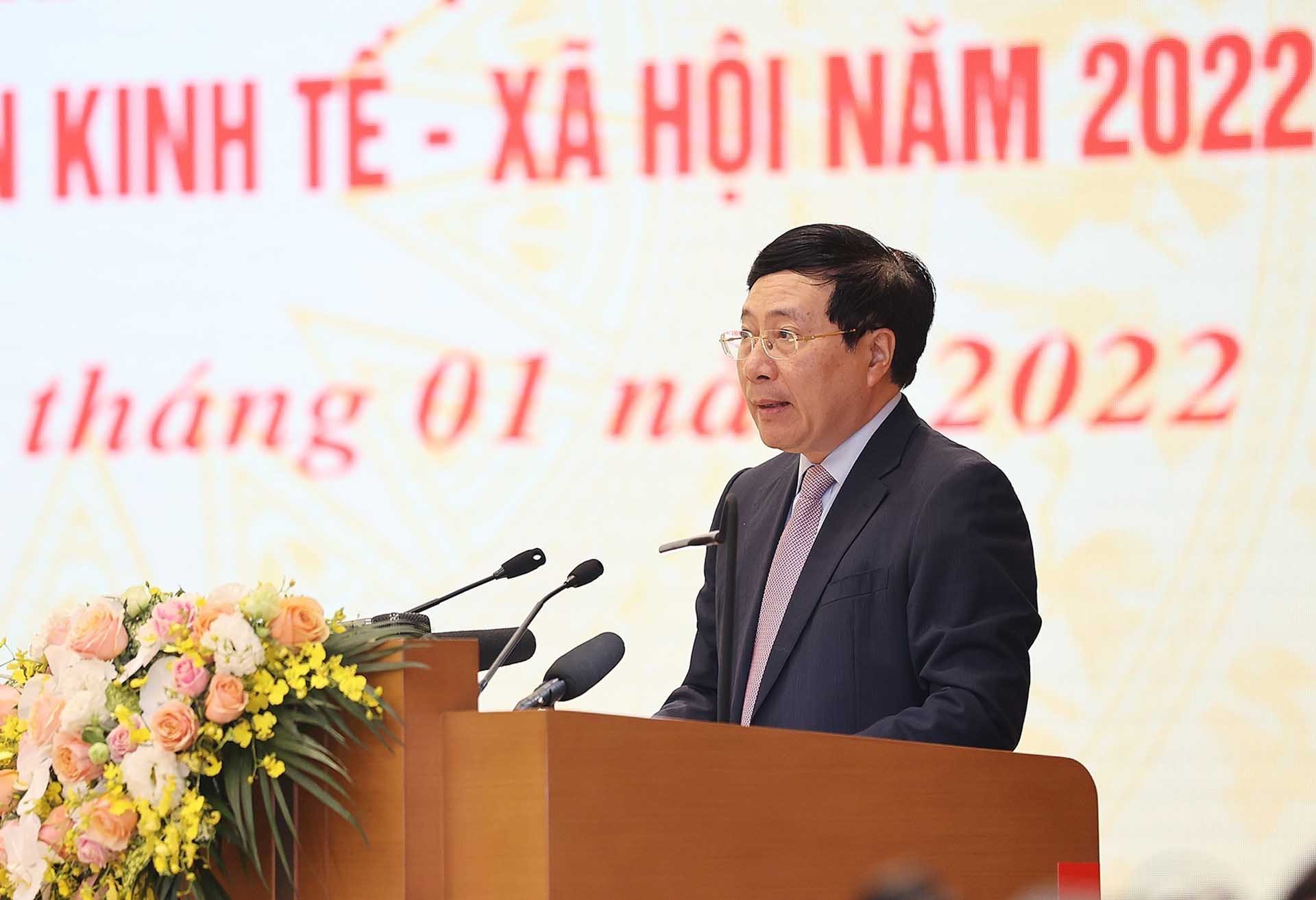 Phó Thủ tướng Thường trực Chính phủ Phạm Bình Minh trình bày Báo cáo về công tác chỉ đạo, điều hành và kết quả thực hiện kế hoạch phát triển kinh tế - xã hội năm 2021; phương hướng, nhiệm vụ năm 2022. (Nguồn: TTXVN)