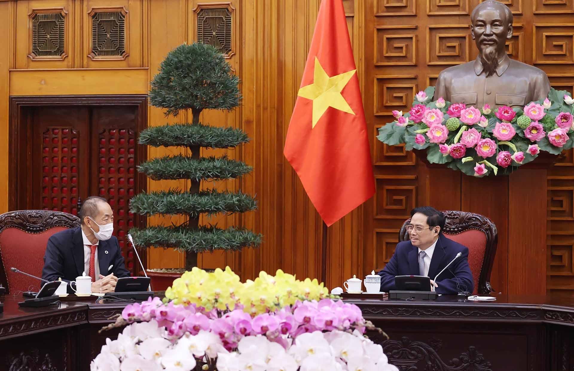 Thủ tướng Phạm Minh Chính tiếp Giám đốc WHO khu vực Tây Thái Bình Dương Takeshi Kasai. (Nguồn: TTXVN)