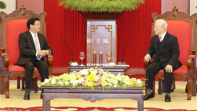 Tổng Bí thư, Chủ tịch nước Nguyễn Phú Trọng tiếp Tổng Bí thư, Thủ tướng Lào Thongloun Sisoulith nhân dịp sang Việt Nam dự Kỳ họp lần thứ 43 Ủy ban liên Chính phủ Việt-Lào về hợp tác song phương tháng 12/2020. (Ảnh: Trí Dũng/TTXVN)