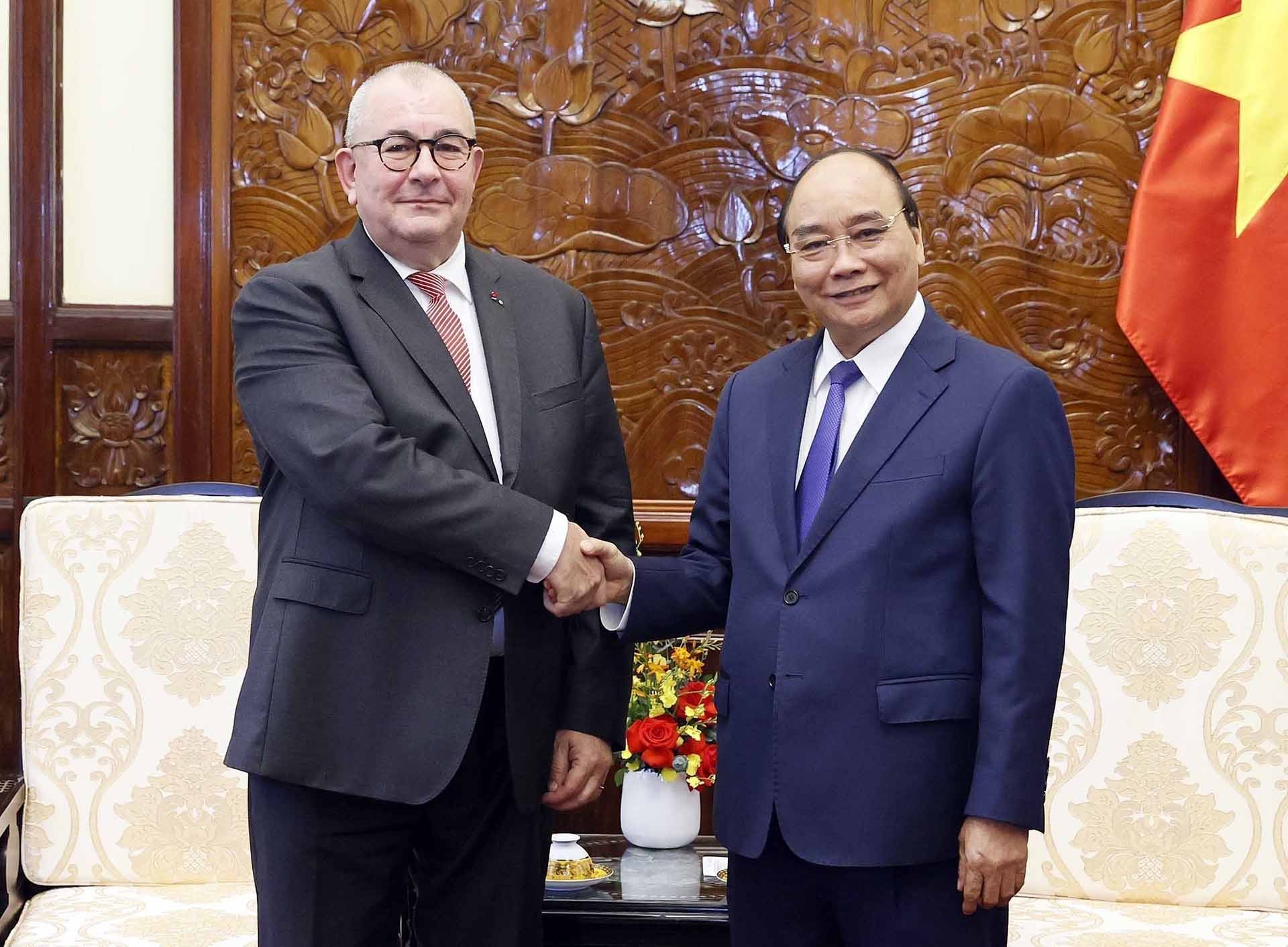 Chủ tịch nước Nguyễn Xuân Phúc tiếp Đại sứ Vương quốc Bỉ Paul Jansen đến chào từ biệt. (Nguồn: TTXVN)