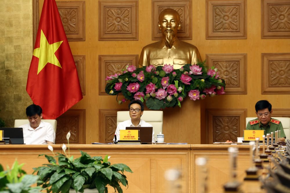 Phó Thủ tướng Vũ Đức Đam, Trưởng Ban Chỉ đạo chủ trì cuộc họp. (Nguồn: VGP) tinh hinh dich covid 19 o da nang quang nam dang duoc kiem soat