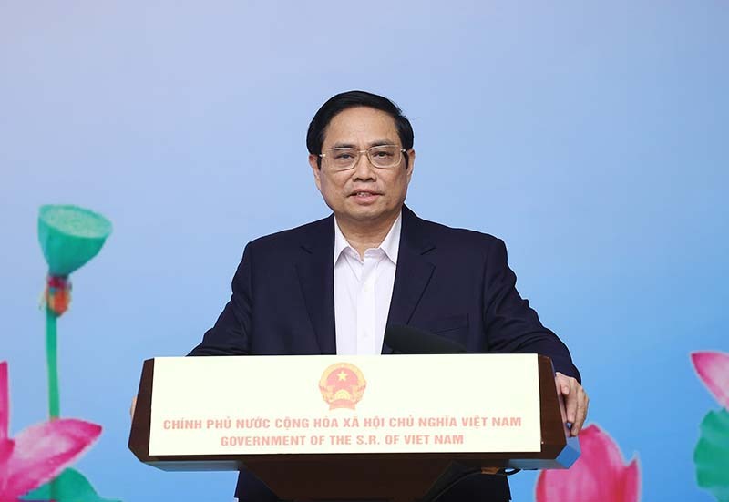 Thủ tướng Phạm Minh Chính động viên, ghi nhận những đóng góp tích cực của lực lượng y tế tuyến đầu chống dịch. (Nguồn: TTXVN)
