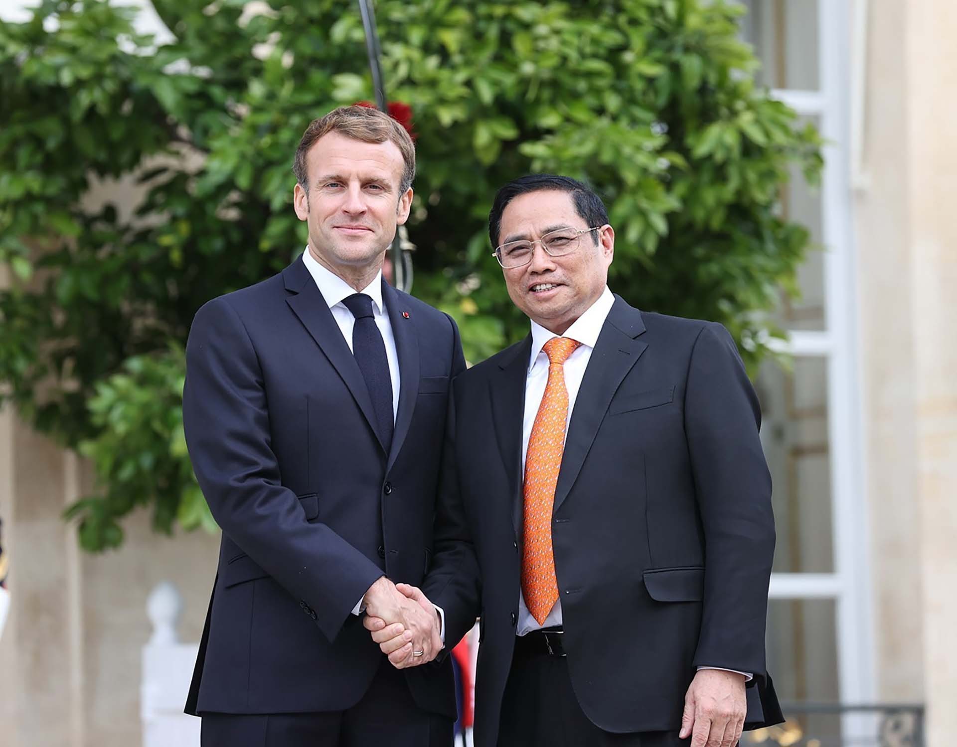 Tổng thống Pháp Emmanuel Macron và Thủ tướng Phạm Minh Chính. (Nguồn: TTXVN)
