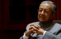 thu tuong malaysia mahathir mohamad dap xe 11km o tuoi 94