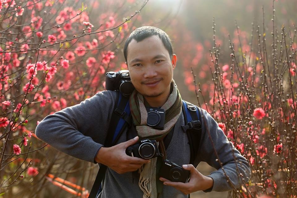 phong vien reuters lan dau chia se ve buc anh co gai vuon dao