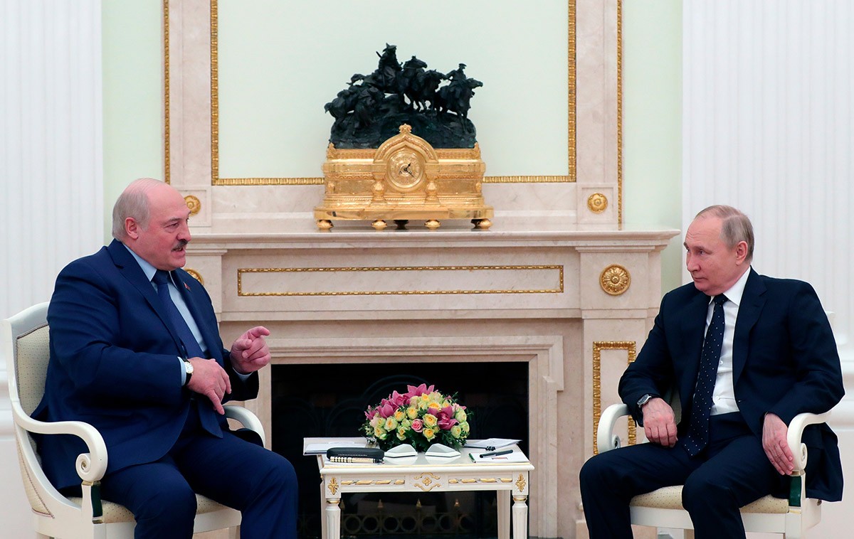 Belarusian President Alexander Lukashenko and Russian President Vladimir Putin meet in Moscow, Russia on March 11. (Mikhail Klimentyev/Sputnik/AP)
