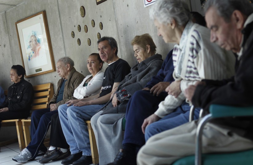 Patients with Alzheimer's and dementia are sit inside the Alzheimer foundation in Mexico City