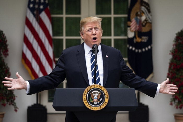 imf chien tranh thuong mai leo thang nguoi tieu dung my chiu tran