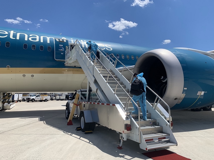 Chuyến bay thực hiện nghiêm các biện pháp phòng dịch 5K theo tiêu chuẩn quốc tế đối với tất cả mọi hành khách (Ảnh: VNA)