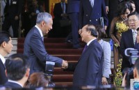 tong bi thu thu tuong tiep doan cap cao dang hanh dong nhan dan singapore cam quyen