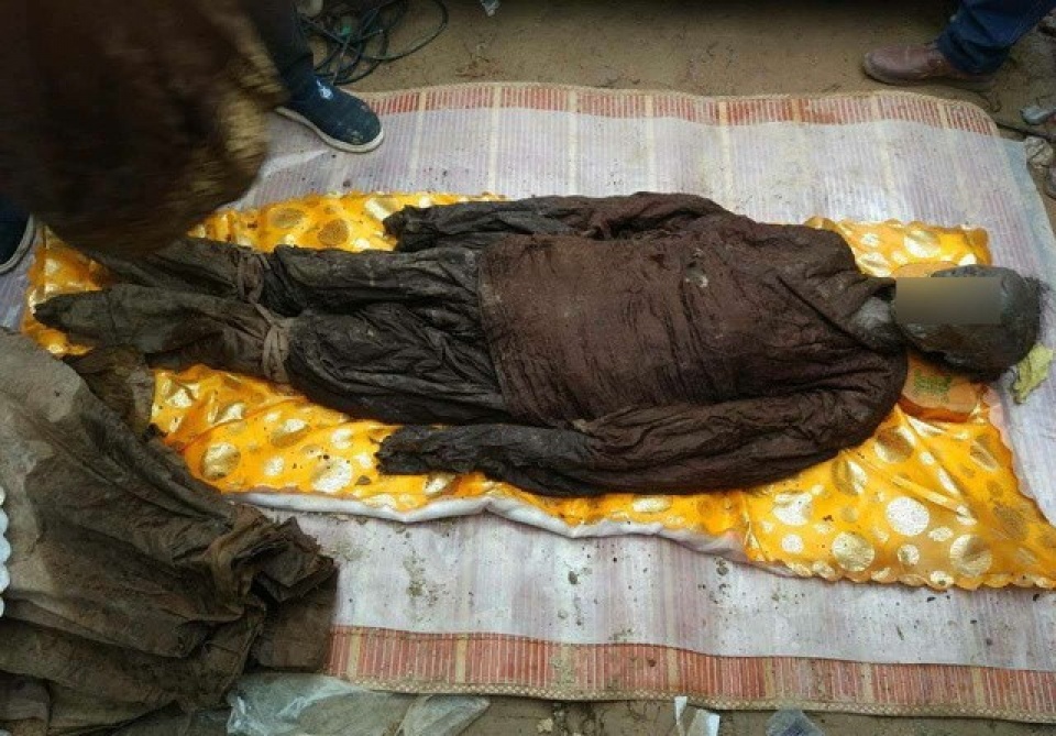 phat hien thi the gan nhu duoc giu nguyen trong ngoi mo co