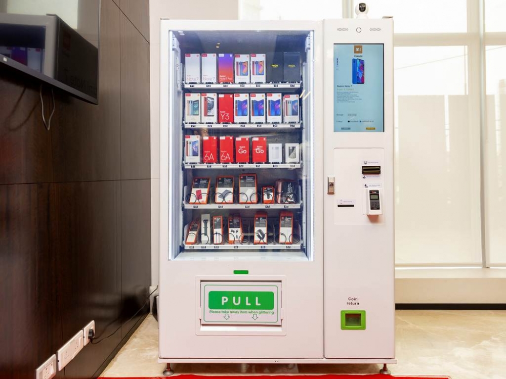 xiaomi voi may ban dien thoai tu dong nhu nuoc ngot