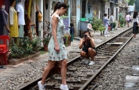 tst tourist tang khach hang goi bao hiem corona