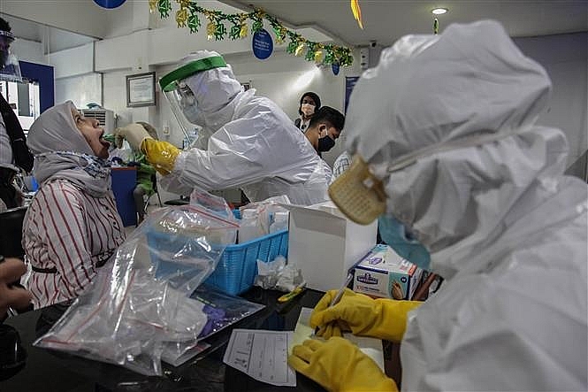 2606 vna potal covid 19 indonesia ghi nhan hon 1000 ca nhiem moi trong ngay 4817178