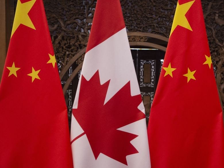 trung quoc bat giu them mot cong dan canada