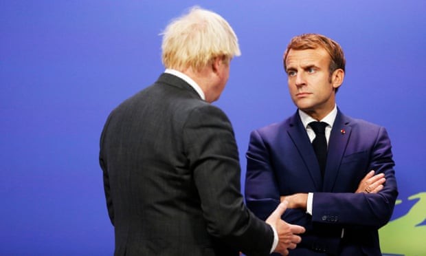 Bất đồng xuất hiện giữa hai nhà lãnh đạo Pháp-Anh liên quan tới vấn đề người di cư. (Nguồn: Guardian)