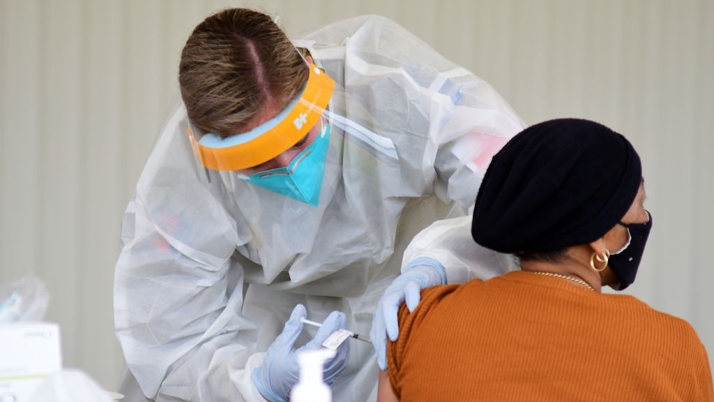 covid19 australia day manh chien dich tiem phong