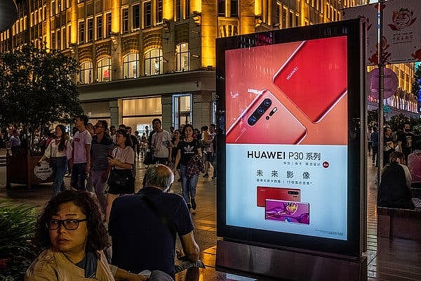 tra dua my huawei tong khu nhieu nhan vien my dang lam viec tai tru so trung quoc ve nuoc