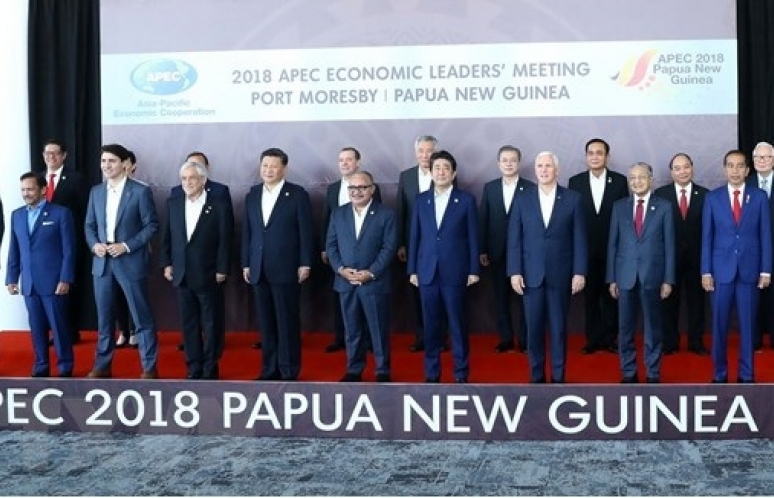APEC 2018: Đằng sau bức ảnh “bằng mặt nhưng không bằng lòng“