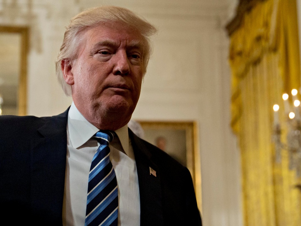 tong thong trump bi kien do de xay ra xung dot loi ich