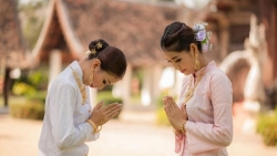 Learn the Thai greeting with hands clasped in front of the chest