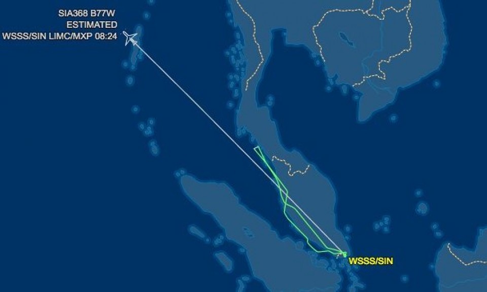 may bay singapore airlines boc chay phai ha canh khan cap