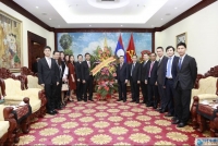 Thứ trưởng Bộ Ngoại giao Nguyễn Minh Vũ chúc mừng Quốc khánh CHDCND Lào