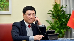 Phó Thủ tướng Phạm Bình Minh điện đàm Cố vấn An ninh quốc gia Hoa Kỳ về việc điều tra chính sách tiền tệ của Việt Nam