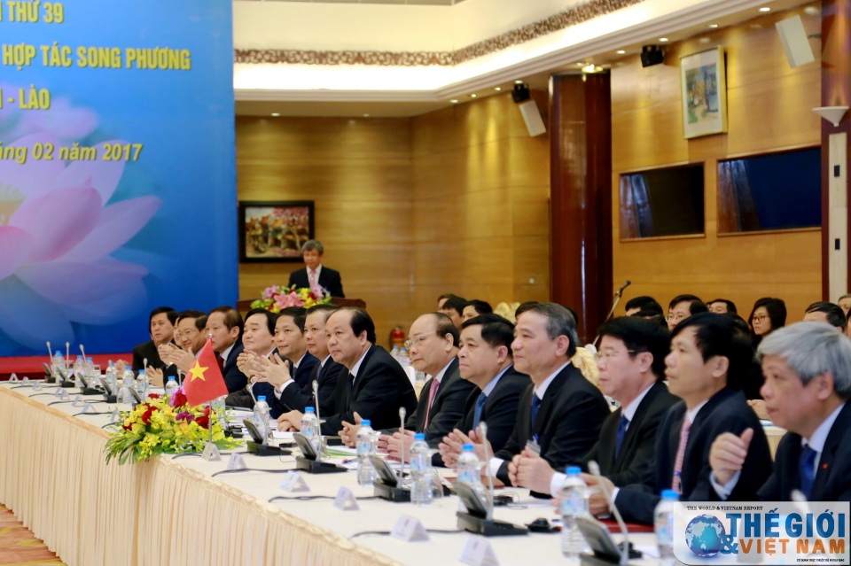 thu tuong viet lao chu tri hop uy ban lien chinh phu