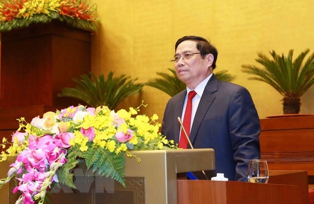 Trưởng Ban Tổ chức Trung ương Phạm Minh Chính giới thiệu, quán triệt chuyên đề: “Báo cáo tổng kết công tác xây dựng Đảng và thi hành Điều lệ Đảng của BCHTW khóa XII tại Đại hội XIII của Đảng.” (Ảnh: Phương Hoa/TTXVN)