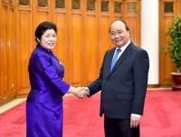 dai su nguyen ba hung trinh quoc thu len chu tich nuoc lao