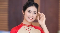Hoa hậu Ngọc Hân đẹp 'không tì vết' trong tà áo dài